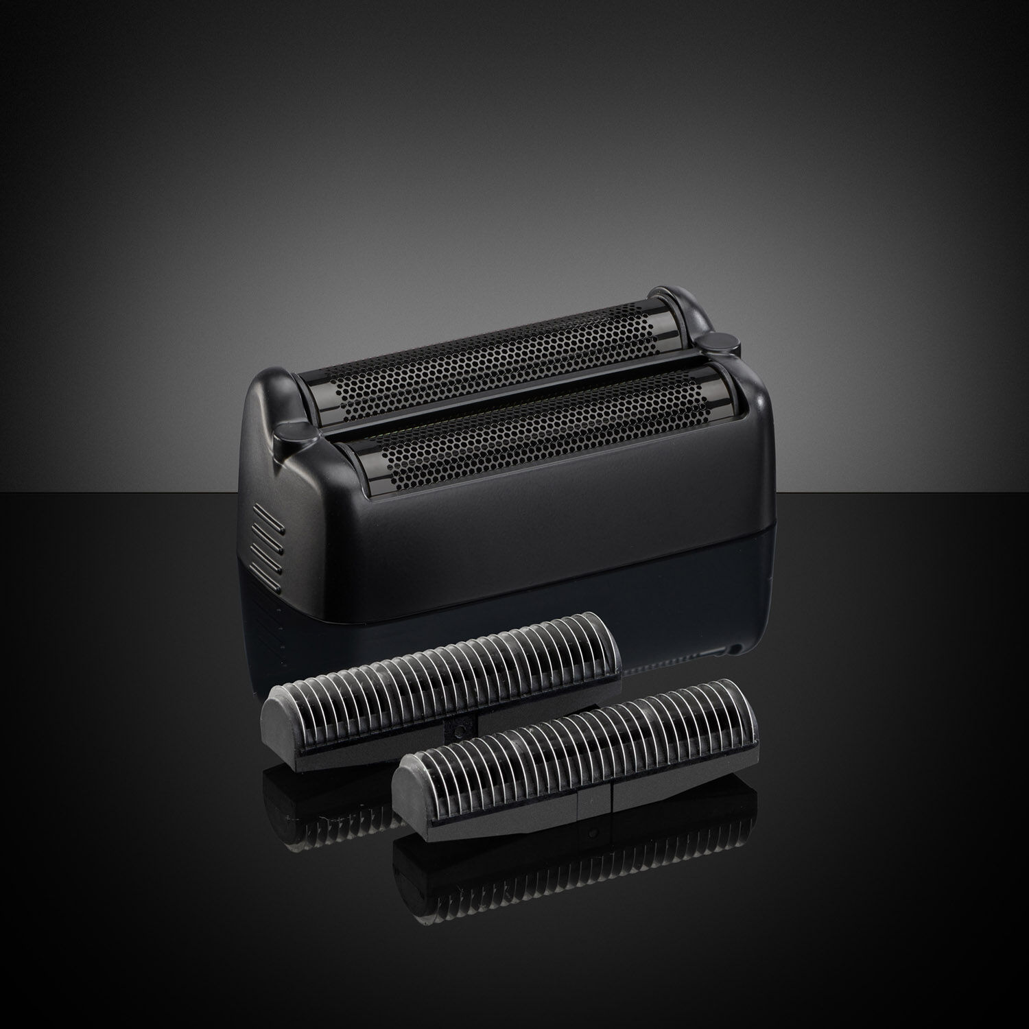 Black Titanium Double-Foil Shaver Replacement Kit on a dark background